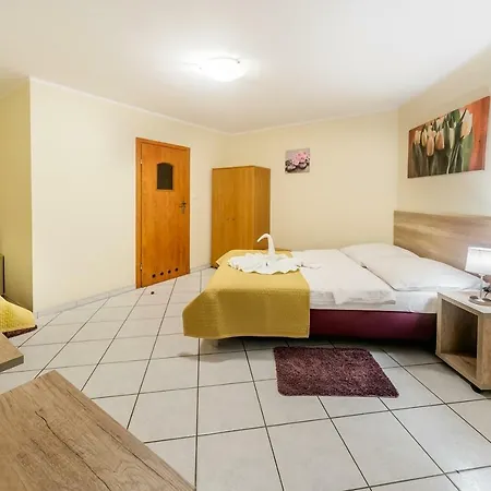 Δωμάτια σε οικογενειακή κατοικία Tusia *